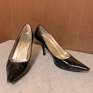Shiny black patent leather heels